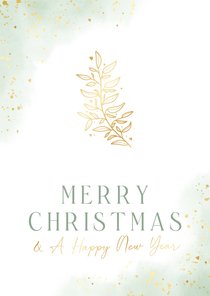 Originele kerstkaart met groene waterverf en gouden takje