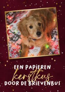 Stijlvolle kerstkaart papieren kus door de brievenbus