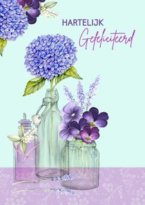 Verjaardag vaasjes bloemen
