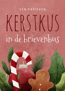 Vrolijke kerstkaart een papieren kerstkus in de brievenbus