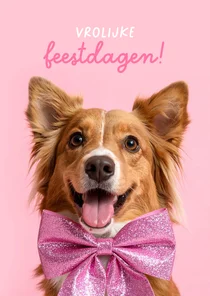 Vrolijke kerstkaart met hond en roze strik