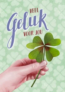 Wenskaart hand met geluksklaver voor jou