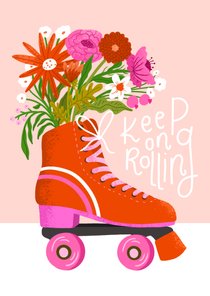 Wenskaart 'keep on rolling' met rolschaats en bloemen