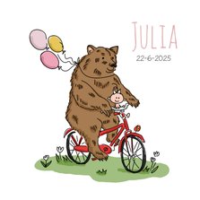 Grote beer op fiets met baby en roze ballonnen