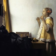 Johannes Vermeer. Jonge vrouw met parelketting