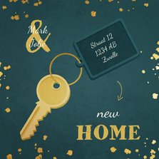 Kerst-verhuiskaart sleutel met label new home