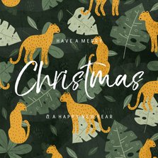 Kerstkaart met jungle patroon en handgeschreven christmas