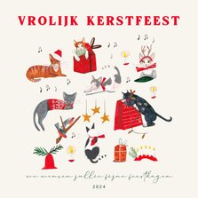 Kerstkaart met poezen en kerst decoratie