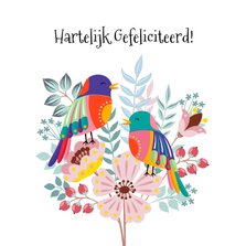 Kleurige verjaardagskaart met bloemen en vogel