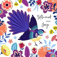 Kleurrijke verjaardagskaart paradijsvogel bloemen