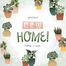 Leuke felicitatiekaart new home met plantjes en hartjes