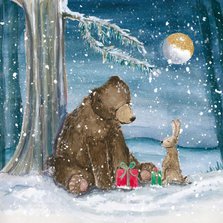 Mooie kerstkaart met beer en konijn in de sneeuw