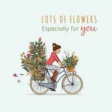 Verjaardagskaart op de fiets met veel bloemen