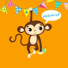 Verjaardagskaart vrolijk aapje met banaan en slingers