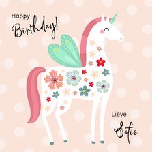 Vrolijke en kleurrijke verjaardagskaart unicorn met vleugels