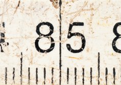 85 op oude witte duimstok