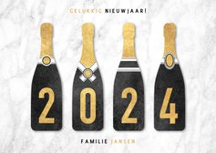 Leuke nieuwjaarskaart champagneflessen met 2024