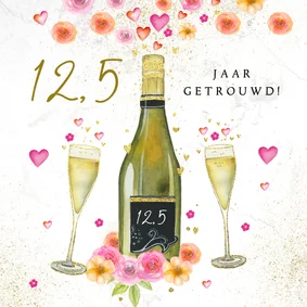 Huwelijksjubileum champagne bloemen