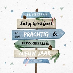 Kerstkaart hip met wegwijzers