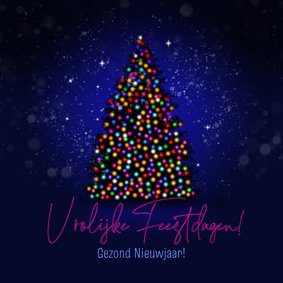 Kerstkaart kerstboom lichtjes en sneeuw