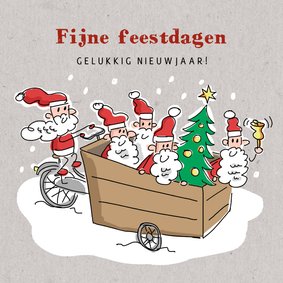 Kerstkaart met kerstmannetjes en kerstboom in bakfiets