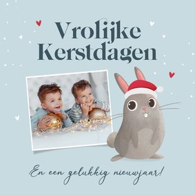 Kerstkaart voor kinderen konijn hartjes foto vrolijk