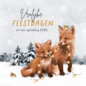 Kerstkaart winter vosjes landschap kerstlampjes 