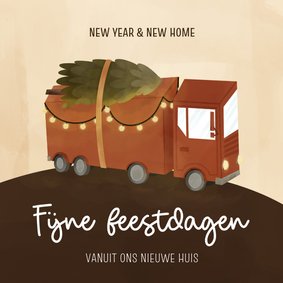 Kerstverhuiskaart met vrachtwagen met kerstboom