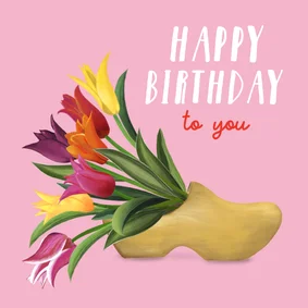 Kleurrijke verjaardagskaart met klomp en tulpen