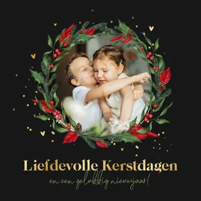 Liefdevolle kerstkaart kersttakjes krans goud hartjes foto