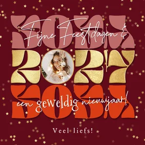Moderne kerstkaart jaartal goudlook sterrenconfetti foto