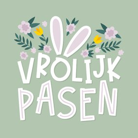 Paaskaart vrolijk pasen met oortjes en bloemen