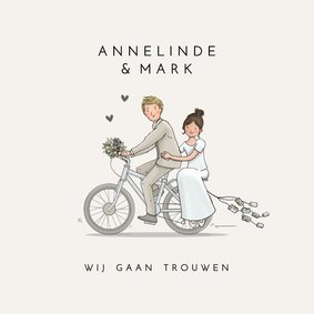 Trouwkaart bruidspaar op fiets met bloemen