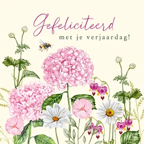 Verjaardagskaart roze hortensia's in de tuin