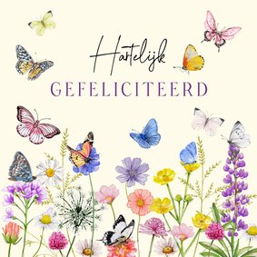 Verjaardagskaart vlinders op veldbloemen