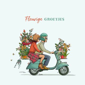 Vespa scooter met bloemen