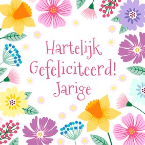 Vrolijke verjaardagskaart met voorjaarsbloemen 