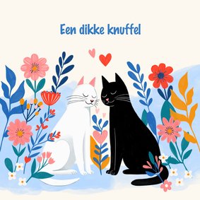 Wenskaart twee katten tussen de bloemen