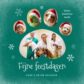 Zakelijke kerstkaart dierenarts pootafdruk foto sneeuw