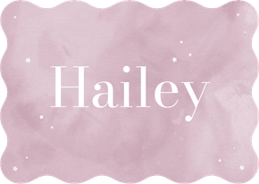 Golvend geboortekaartje met lila waterverf en bloempjes