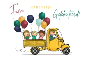 Driewieler met balllonnen