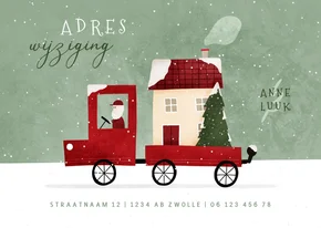 Kerst-verhuiskaartje verhuisbusje met huis en kerstboom