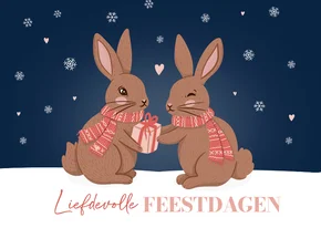 Liefdevolle kerstkaart met konijnen met cadeau donkerblauw