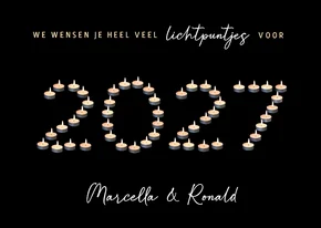 Originele kerstkaart met jaartal 2027 van waxinelichtjes