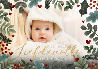 Foto kerstkaart met kersttakjes kader en liefdevolle kerst