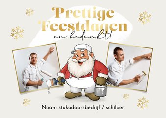 Grappige kerstkaart schilder kerstman witte kerst foto