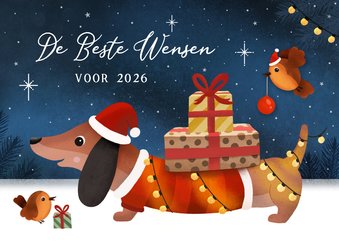 Grappige nieuwjaarskaart met teckel met lampjes en cadeau's