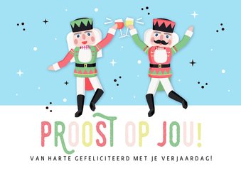 Kerst verjaardagskaart met proostende notenkrakers