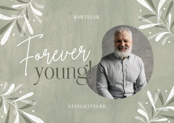 Verjaardagskaart man forever young groen bladeren foto