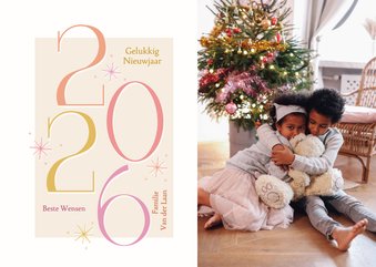 Vrolijke fotokaart nieuwjaar met gekleurde 2026 en sterren
